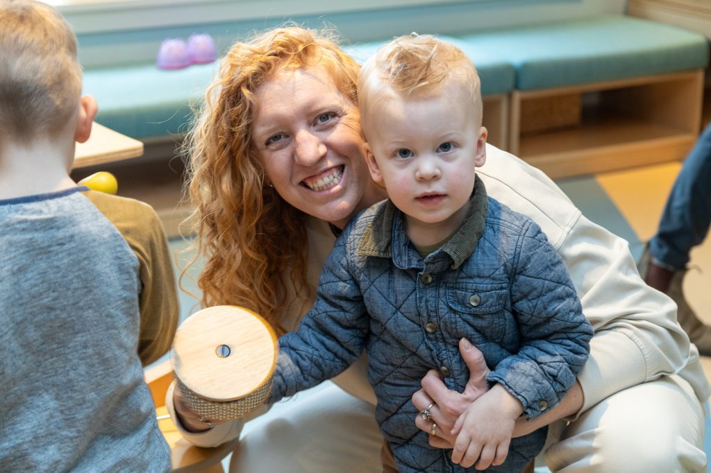 The Braun family enjoy a Music Therapy sessions with Canuck Place Music Therapist Michaela Wallis.