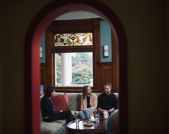 Derek and Rebecca Van Oosterom speak with Canuck Place Counsellor Natasha Zacher.